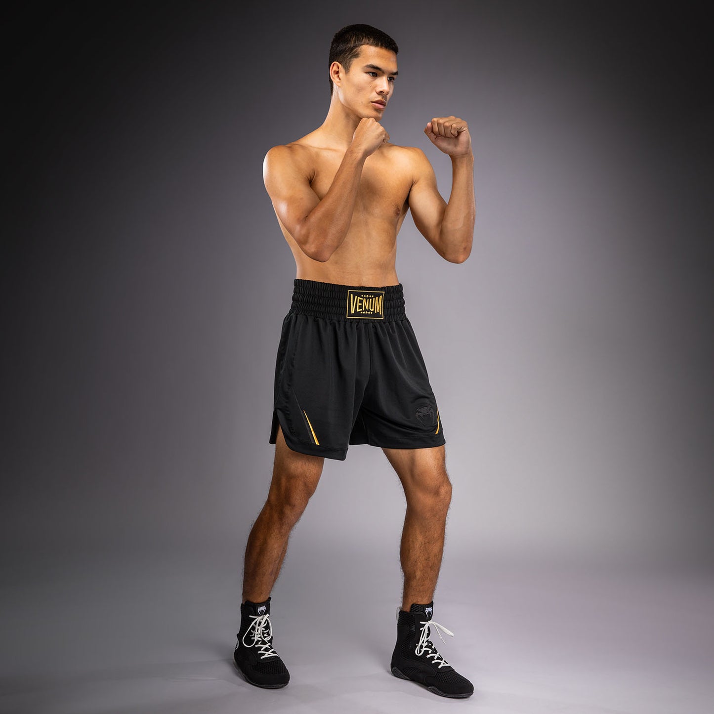 Venum G-Core Pantalón Corto de Boxeo - Negro/Oro