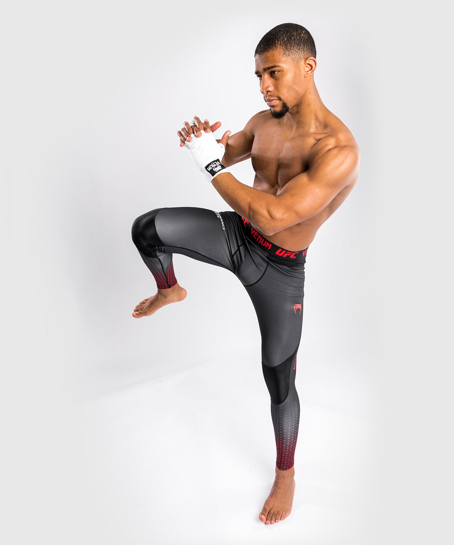 Pantalones de compresión Venum UFC Performance Institute - Negro/Rojo