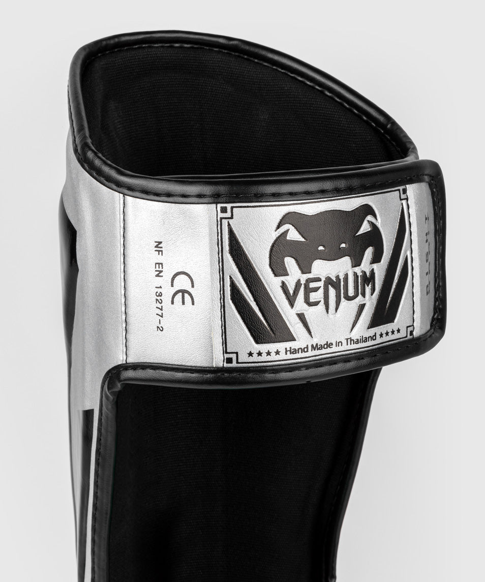 Venum Elite Espinilleras Standup - Plata/Negro