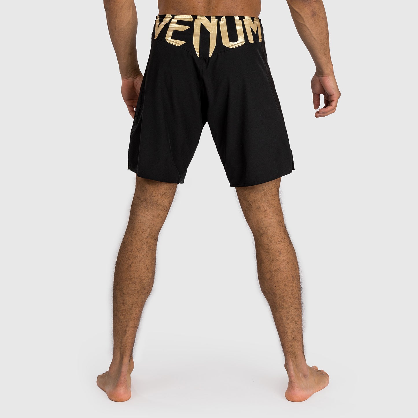 Venum Light 5.0 Fightshorts - Negro/Dorado