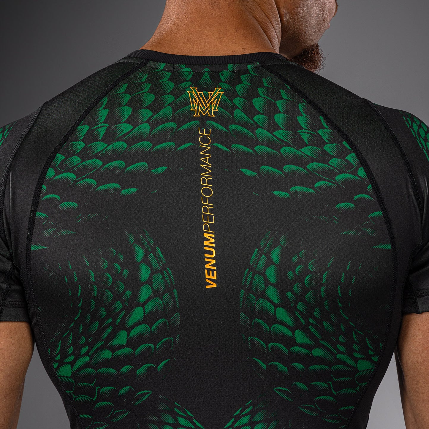 Venum Matupa Rashguard Manga Corta - Negro/Verde/Oro