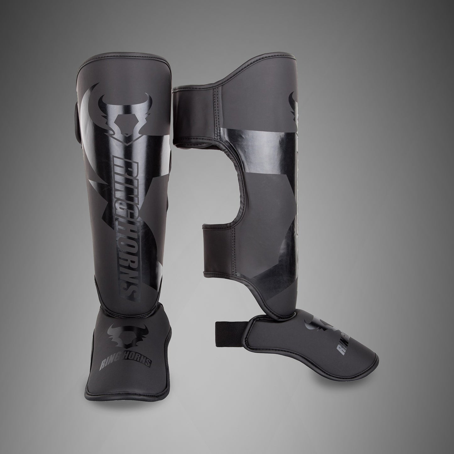 Espinilleras Ringhorns Charger - Negro/Negro