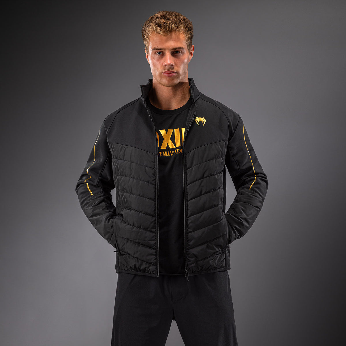 Venum Paddock Chaqueta softshell - Negro/Dorado