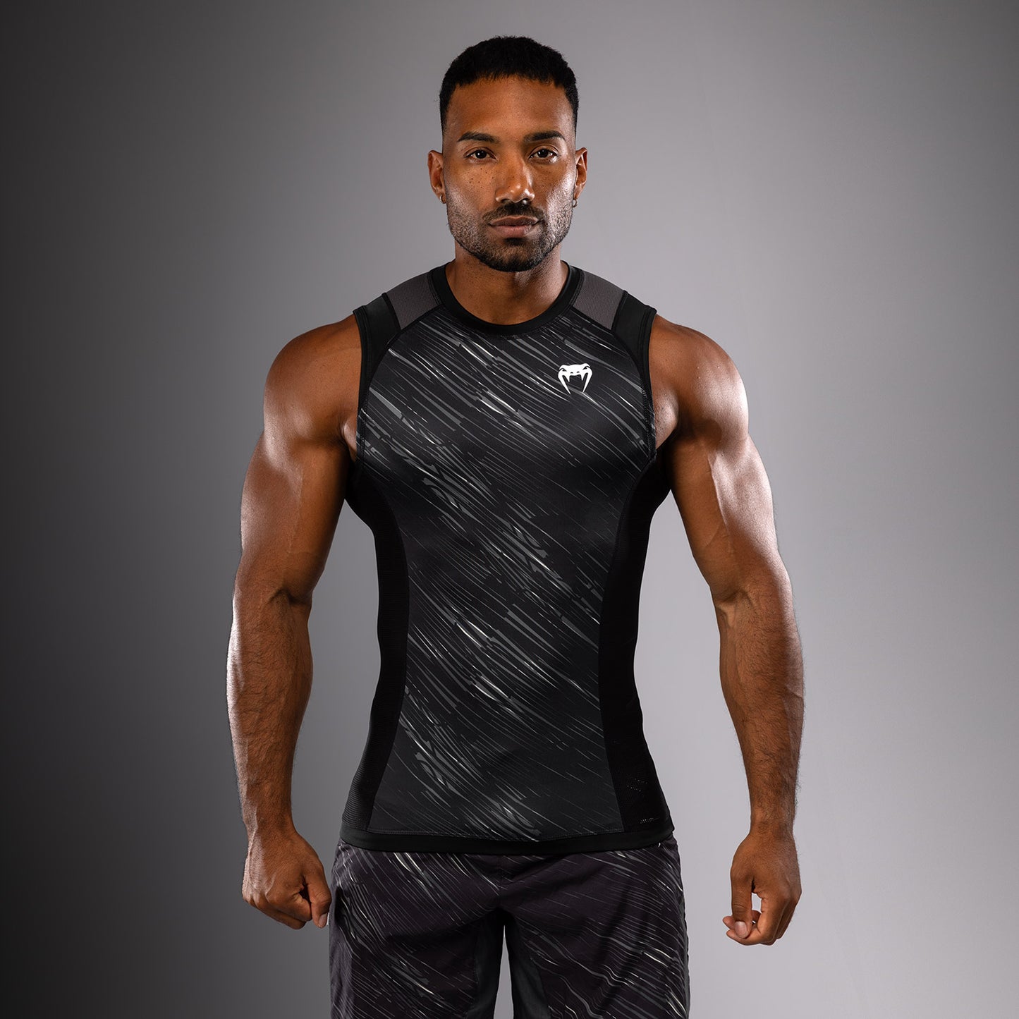 Venum Rapid Rashguard sin Manga - Negro/Gris Tormenta