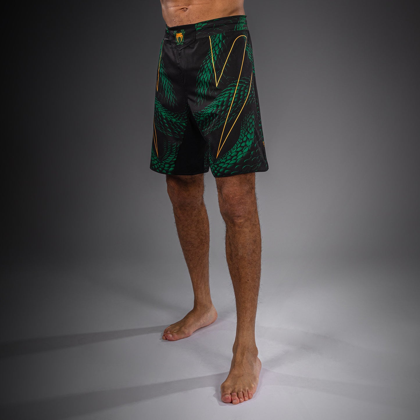 Venum Matupa Short de Combate - Negro/Verde/Oro