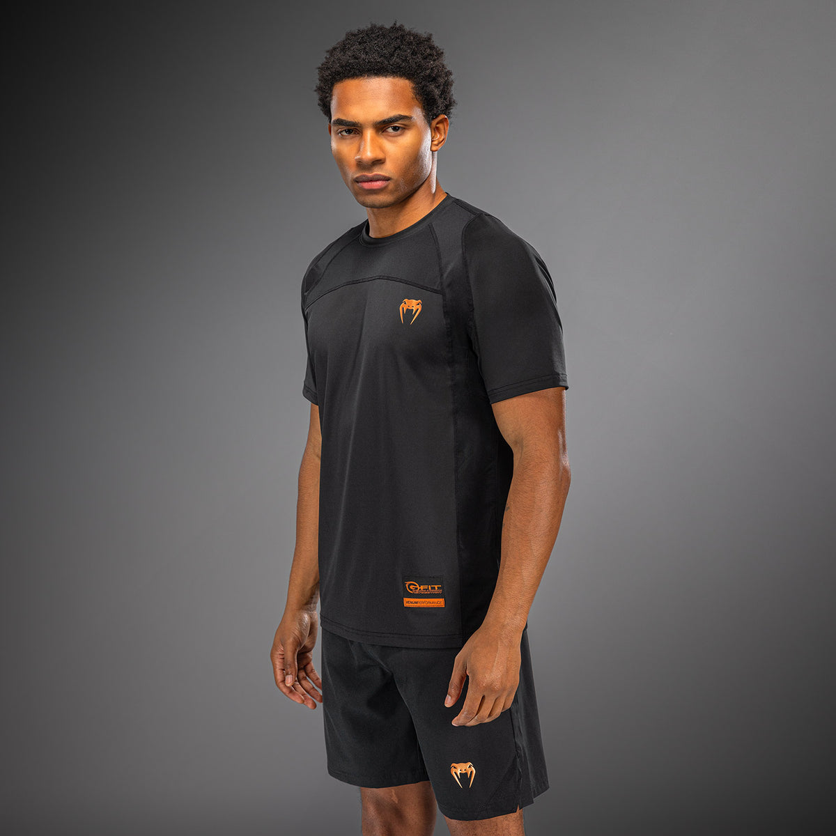 Venum G-Fit Revolution Camiseta Dry Tech - Negro/Cobre