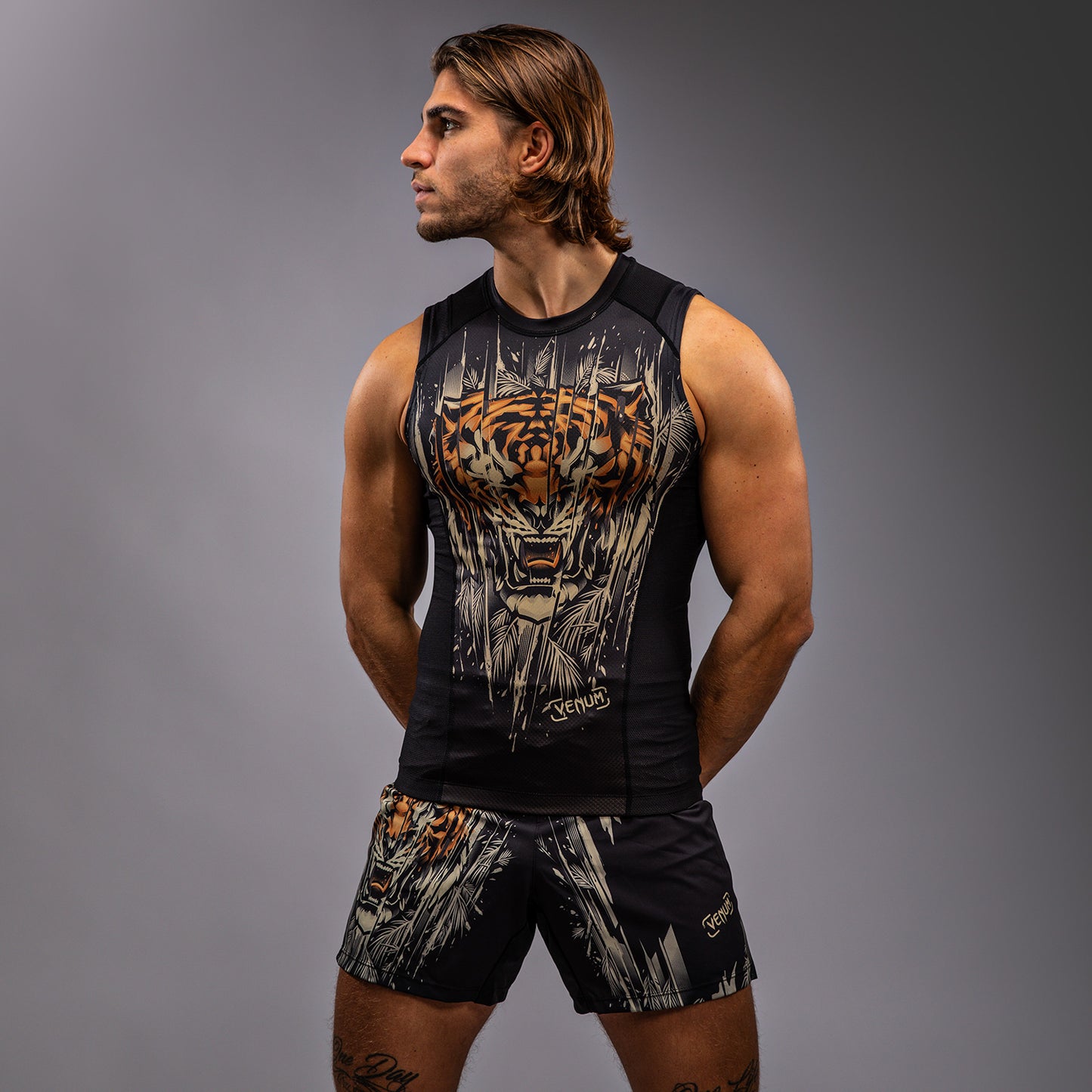 Venum Tiger Rashguard sin Mangas para Hombre - Negro/Naranja Neón
