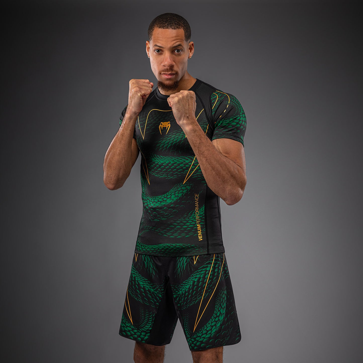 Venum Matupa Rashguard Manga Corta - Negro/Verde/Oro