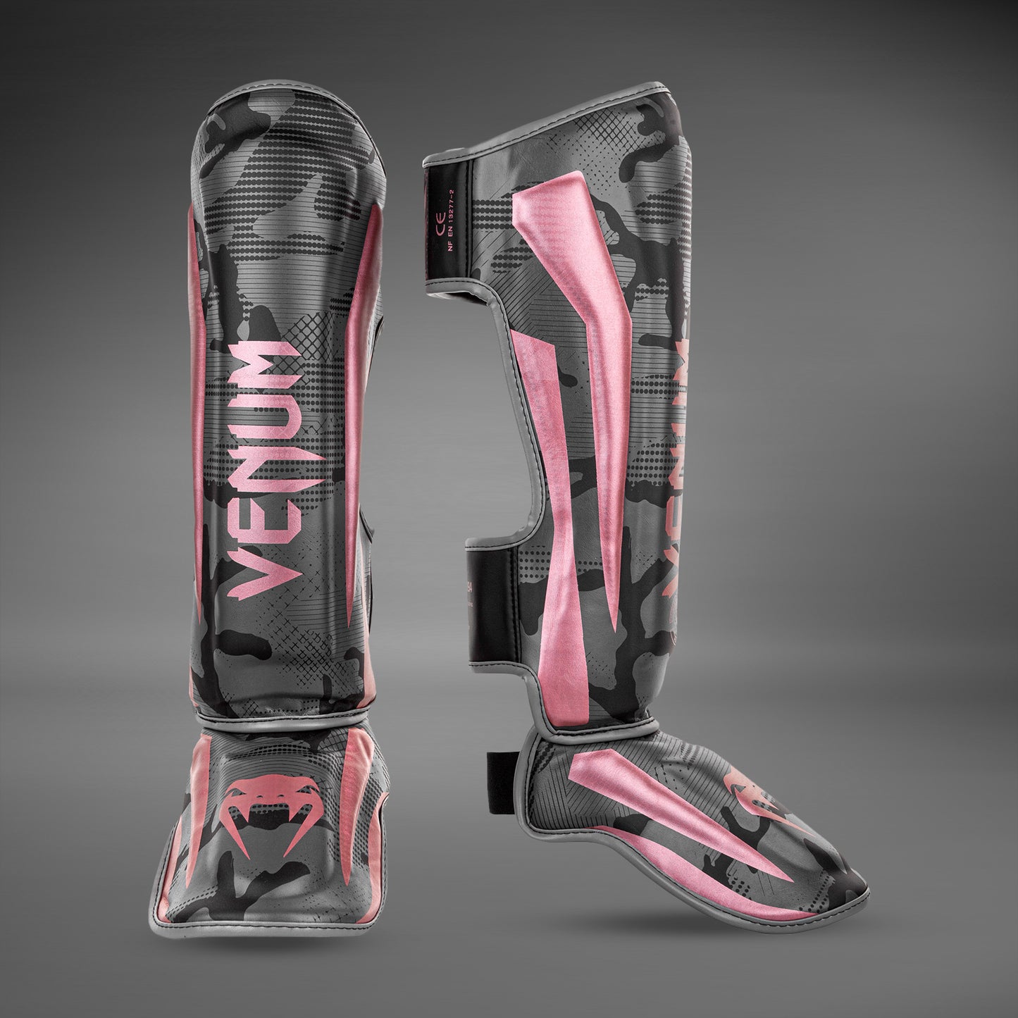 Espinillera Venum Elite - Negra/Rosa/Oro