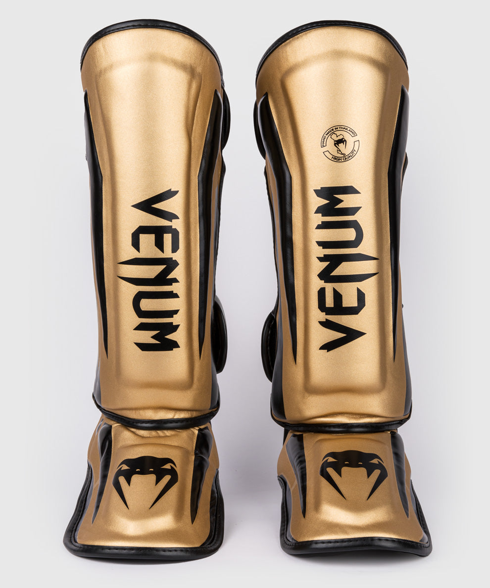 Venum Elite Espinilleras Standup - Oro/Negro