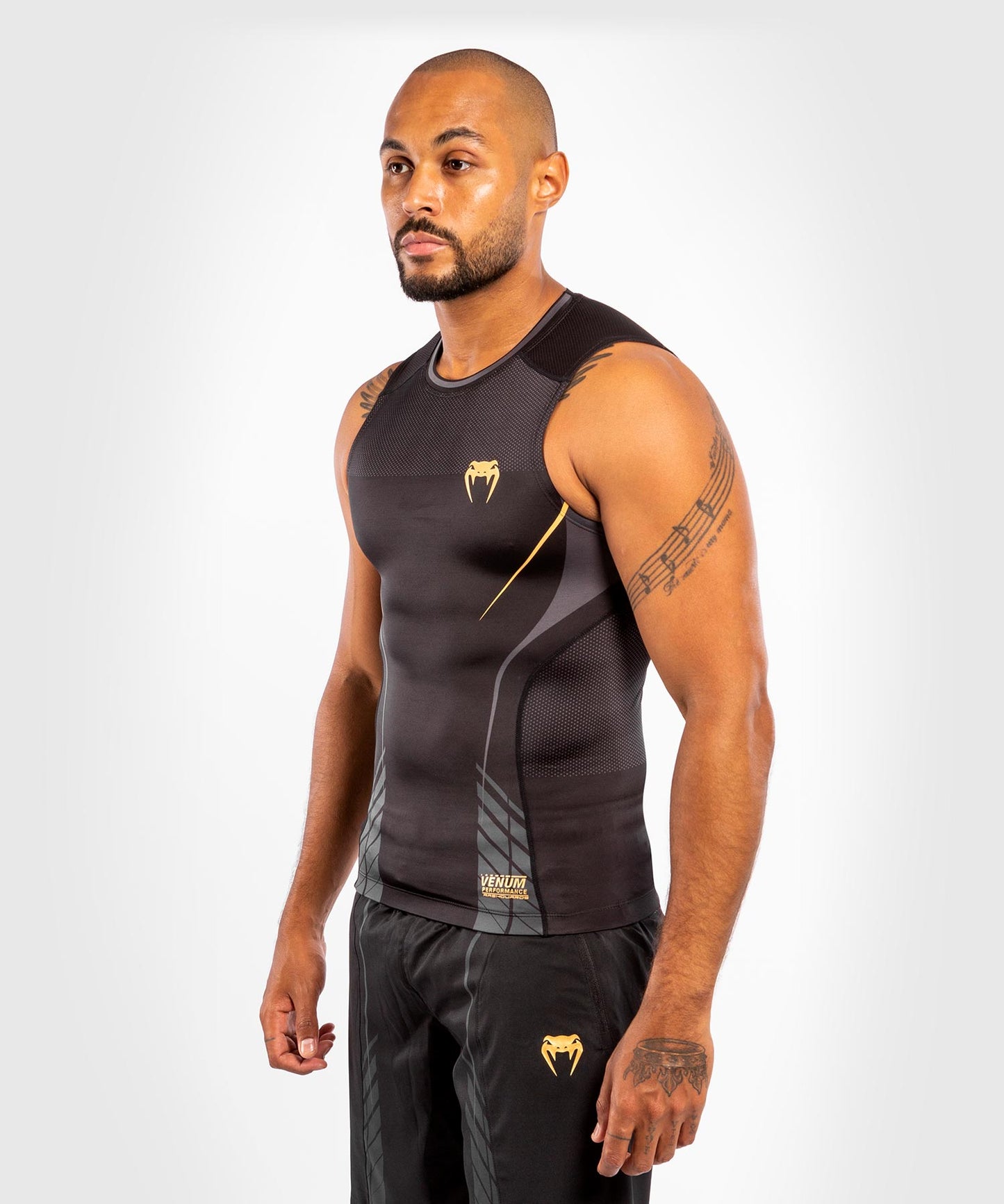 Camiseta sin mangas de compresión Venum Athletics - Negro/Dorado