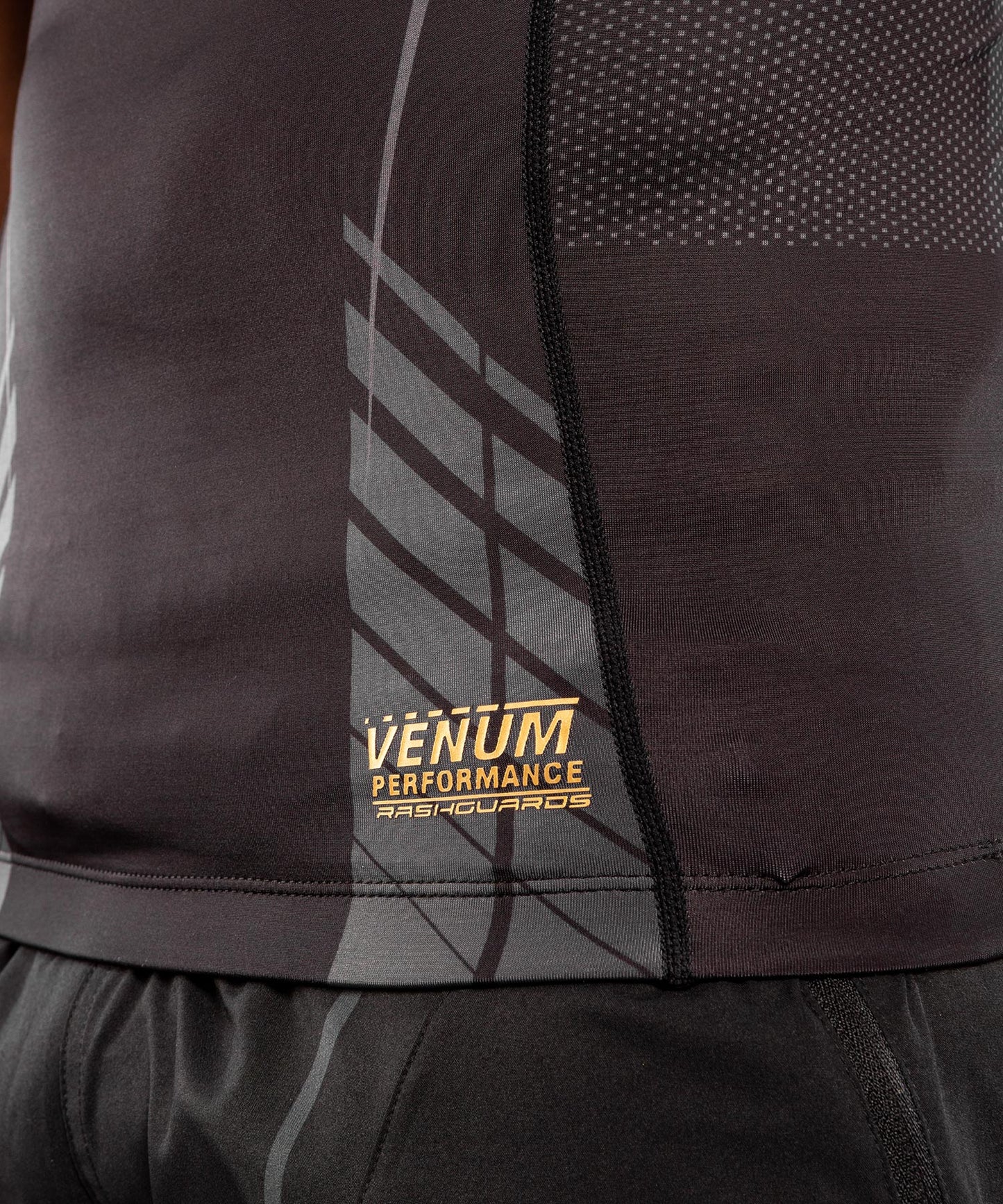 Camiseta sin mangas de compresión Venum Athletics - Negro/Dorado